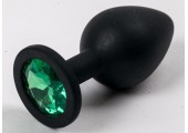 Черная силиконовая анальная пробка с зеленым стразом - 8,2 см.