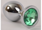 Серебристая анальная пробка с зеленым стразом - 9,5 см.